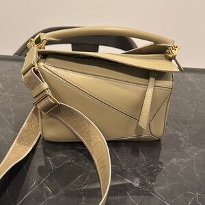 NEW/UNUSED Loewe small puzzle bag in satin calfskin, clay green color.